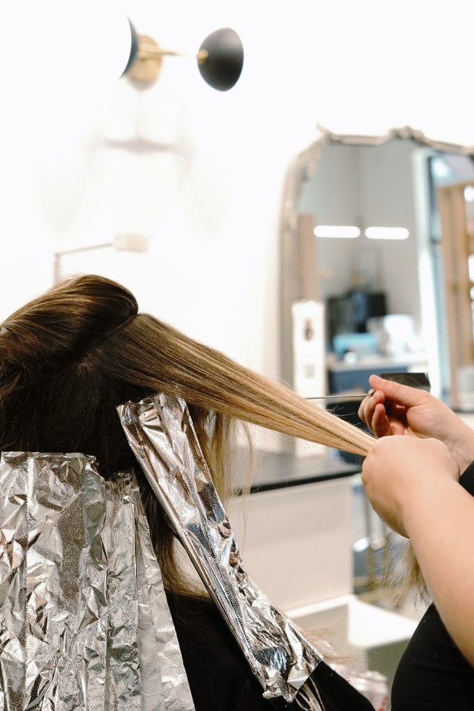 Professional hair coloring service in Wendell NC at Menagerie Style House salon