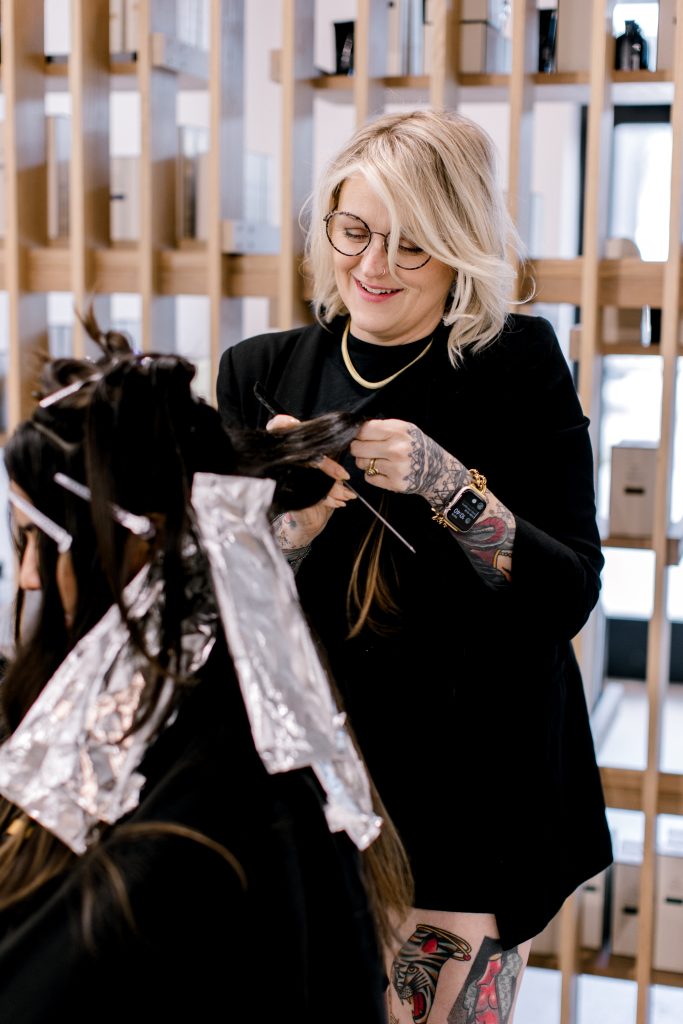 Spring hair transition treatment at Menagerie Style House in Raleigh showing rejuvenated, healthy hair after winter